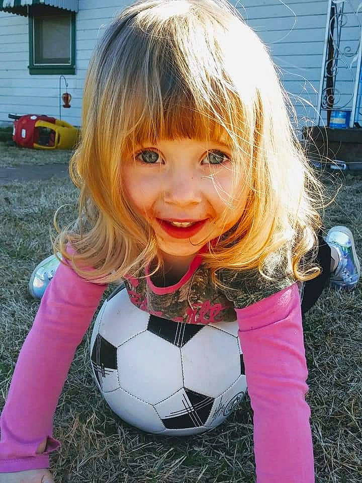 Evanee is registered to the contest to win money with this photo: ball, bangs, blond, child, child_model, fun, grass, hair, hairstyle, joy, lip, person, pink, play, smile
