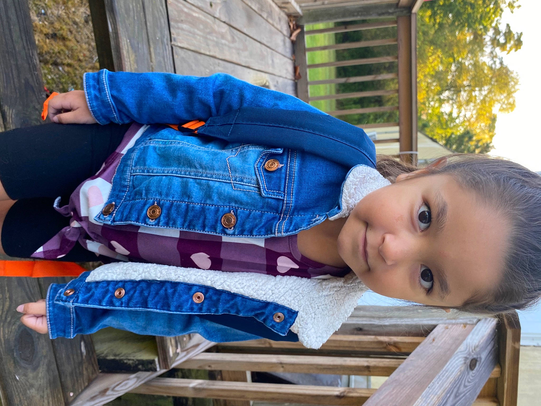 Mariana is registered to the contest to win money with this photo: baby_toddler_clothing, child, denim, electric_blue, grass, leisure, pattern, person, plant, sleeve, toddler, tree, window, wood