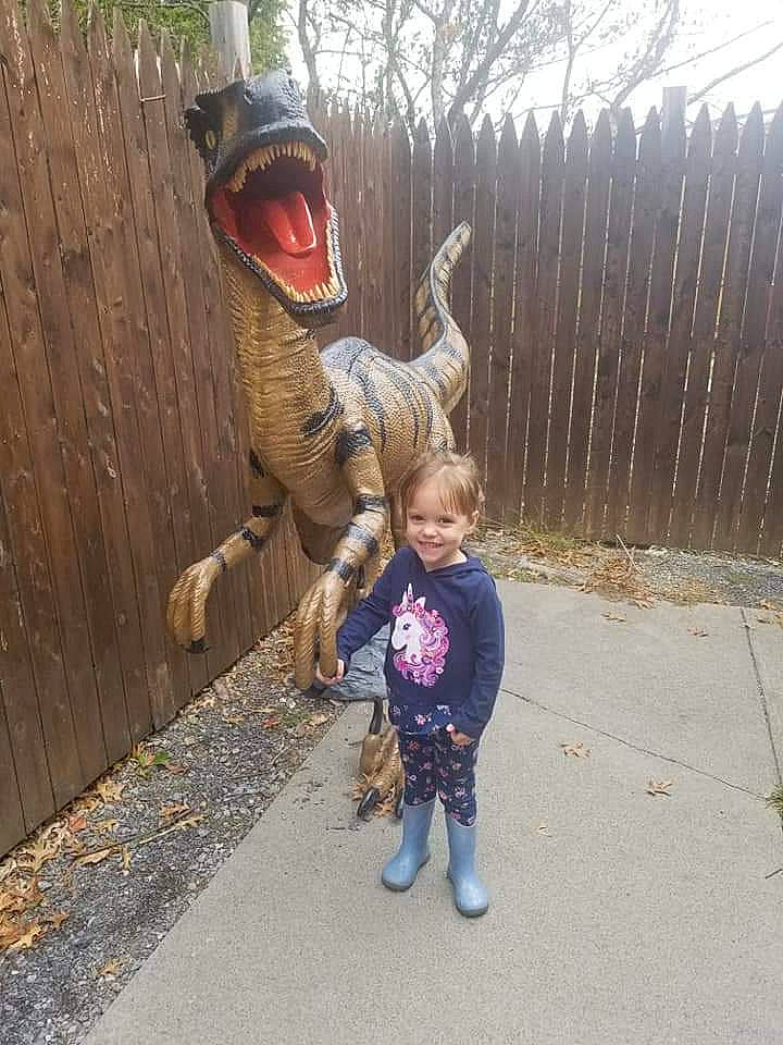 Kyliegh joined the competition — help win amazing prizes! dinosaur, fawn, fun, joy, person, tree, vacation, velociraptor