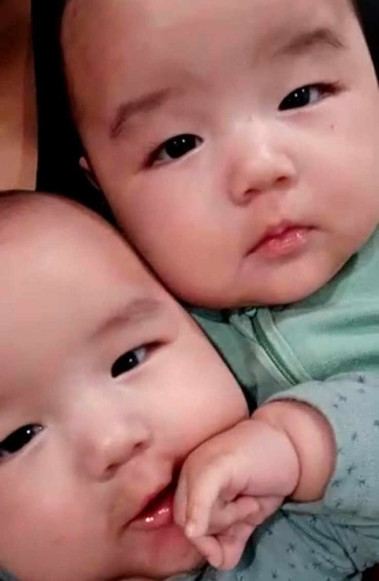 Adriel Y Alberto joined the competition — help win amazing prizes! adorable, baby, chubby_cheeks, closeup, cuddling, eyes, gaze, hand, head, indoor, infant, infant_face, mouth, newborn, onesie, pajamas, portrait, sibling, soft_skin, two_babies