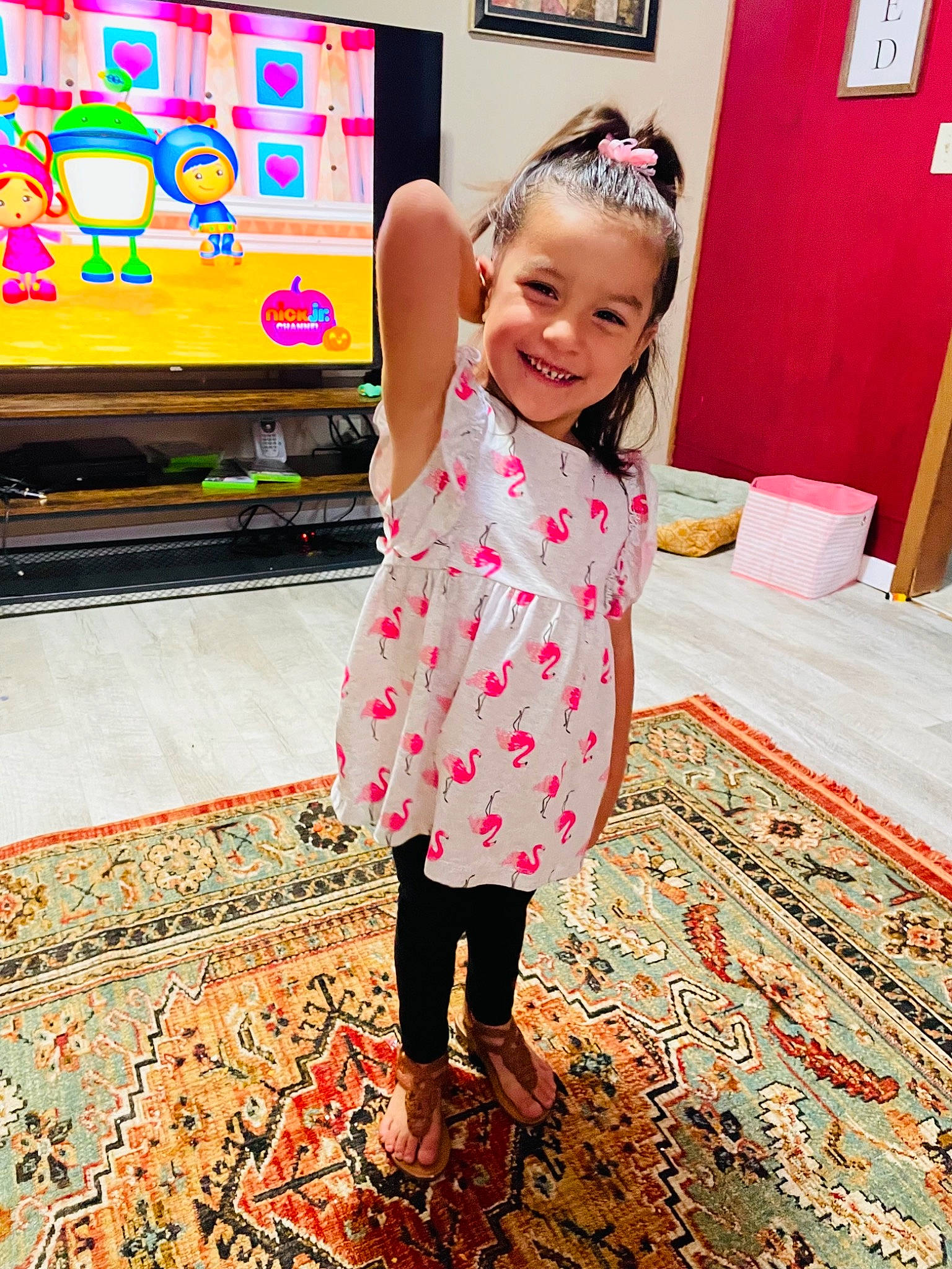 Belen is registered to the contest to win money with this photo: baby_toddler_clothing, carpet, child, fashion_design, floor, flooring, fun, happy, human_leg, joy, leg, leisure, magenta, pattern, people_in_nature, person, play, sandal, shoe, sleeve