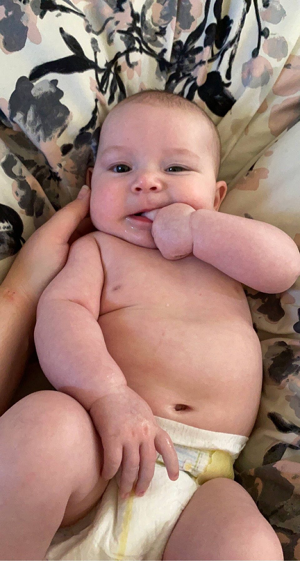Emory Kate is registered to the contest to win money with this photo: arm, baby, baby_toddler_clothing, cheek, chest, comfort, finger, gesture, head, human_body, mouth, muscle, nail, person, photograph, skin, smile, stomach, thumb, toddler