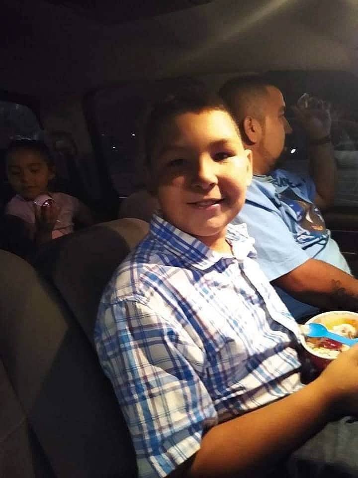 Enrique joined the competition — help win amazing prizes! child, design, food, fun, joy, meal, pattern, person, plaid, sitting, smile, tartan, toddler, under_exposed