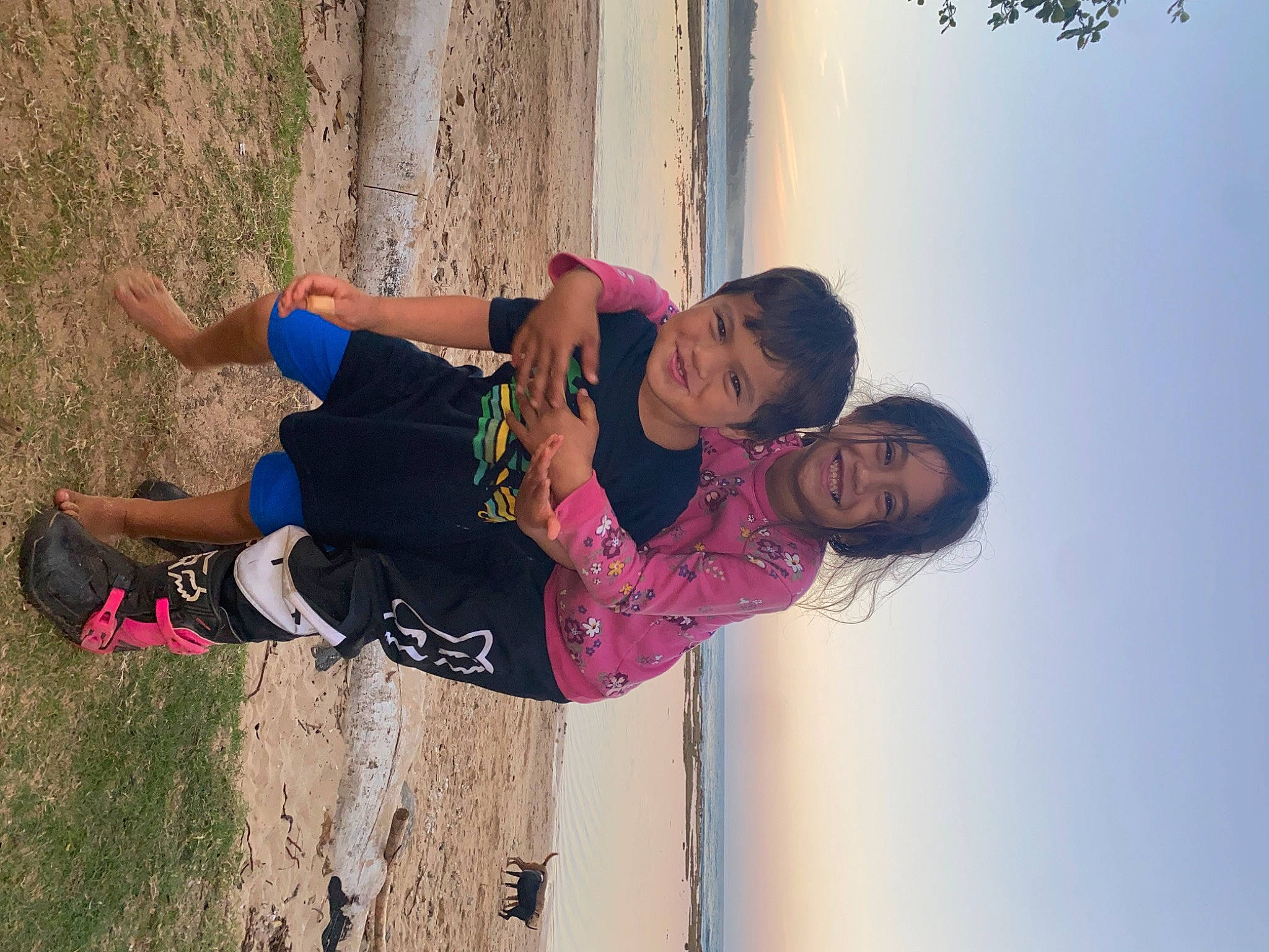 Tiare is registered to the contest to win money with this photo: adventure, beach, boot, child, fun, happy, joy, landscape, leisure, magenta, people_in_nature, person, plant, recreation, sand, sky, smile, soil, toddler, tree