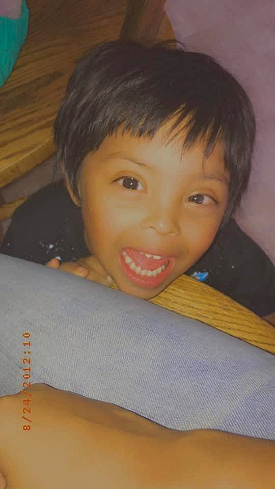 Enrique is registered to the contest to win money with this photo: black_hair, cheek, child, chin, eye, eyebrow, face, facial_expression, forehead, hair, hairstyle, head, lip, neck, nose, person, skin, smile, toddler