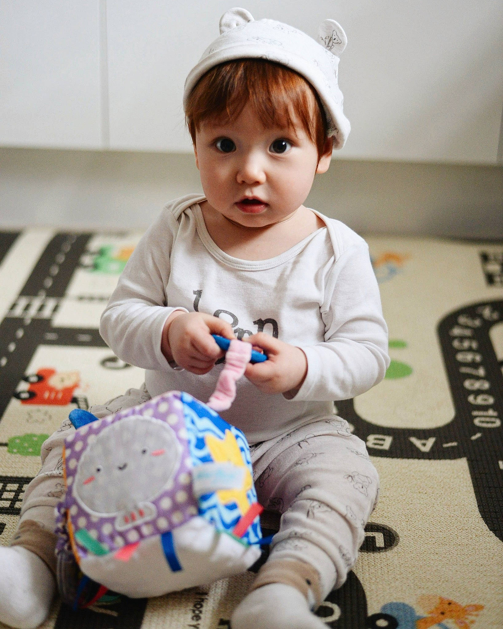 Callum joined the competition — help win amazing prizes! baby, baby_playing_with_toys, baby_toddler_clothing, baby_toys, cap, child, eye, face, fun, happy, person, photograph, play, sitting, skin, sleeve, snapshot, t_shirt, toddler, toy