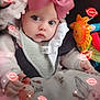 baby, child, pink_bow, blanket, toy, sparkles, glowing_lips, clothing, cute, face, hand, seatbelt, car_seat, indoor, portrait, infant, soft_toys, warm_clothes, expression, closeup