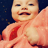 Manon participe au concours pour gagner de l'argent avec cette photo : baby, smiling, face, pink_clothing, hand, sparkles, glowing, portrait, cute, happy, infant, child, cozy, closeup, cheerful, soft_lighting, warm_colors, cute_expression, adorable, young_child