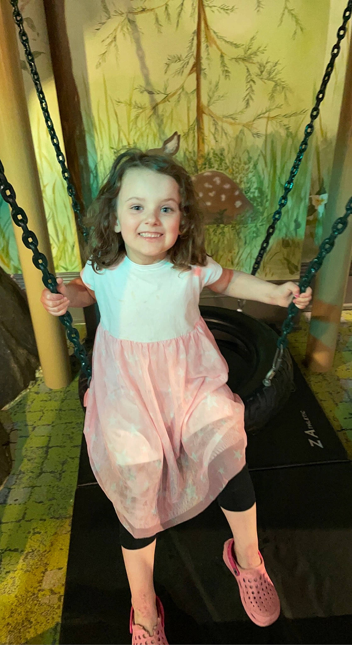 Saryah is registered to the contest to win money with this photo: blond, child, dress, fashion, flash_photography, fun, hairstyle, happy, iris, joy, leisure, long_hair, person, pink, recreation, shoulder, smile, standing, summer, swing