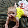 Ellie joined the competition — help win amazing prizes! baby, infant, pacifier, yellow_outfit, crawling, carpet, striped_carpet, blanket, toy, earring, blue_eyes, bare_foot, sleeveless, portrait, indoor, child, playtime, floor, cute, curious_expression