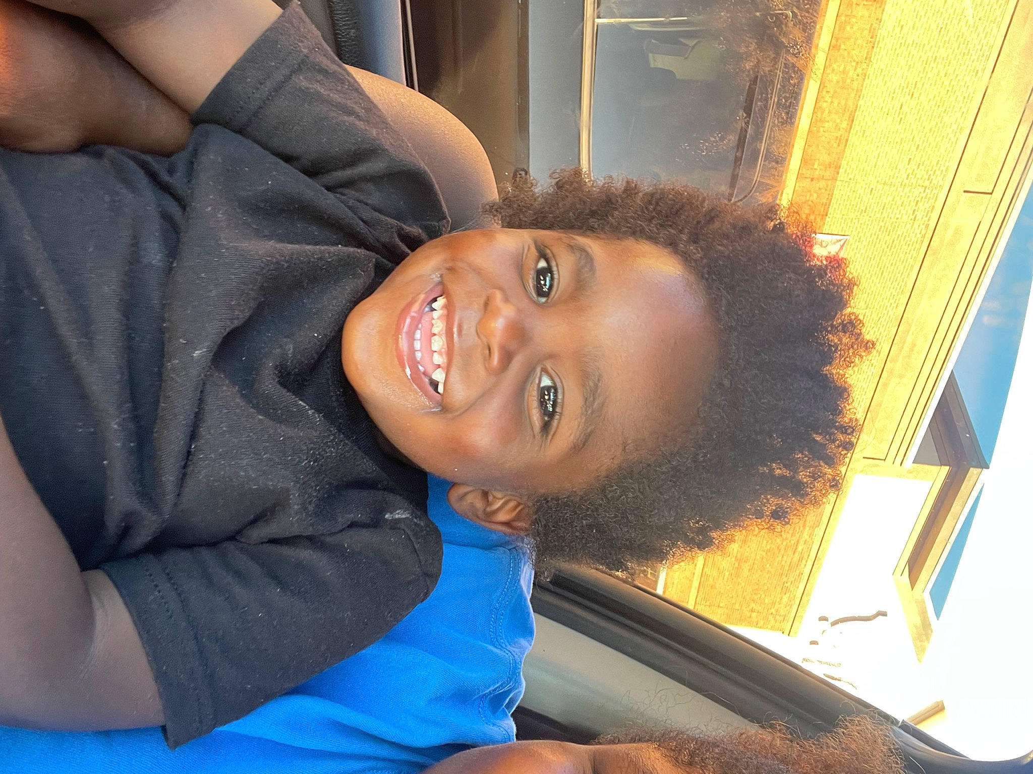 Karter is registered to the contest to win money with this photo: black_hair, cheek, comfort, elbow, electric_blue, eyebrow, facial_expression, flash_photography, forehead, fun, happy, joint, joy, leisure, mouth, muscle, nose, person, sitting, smile