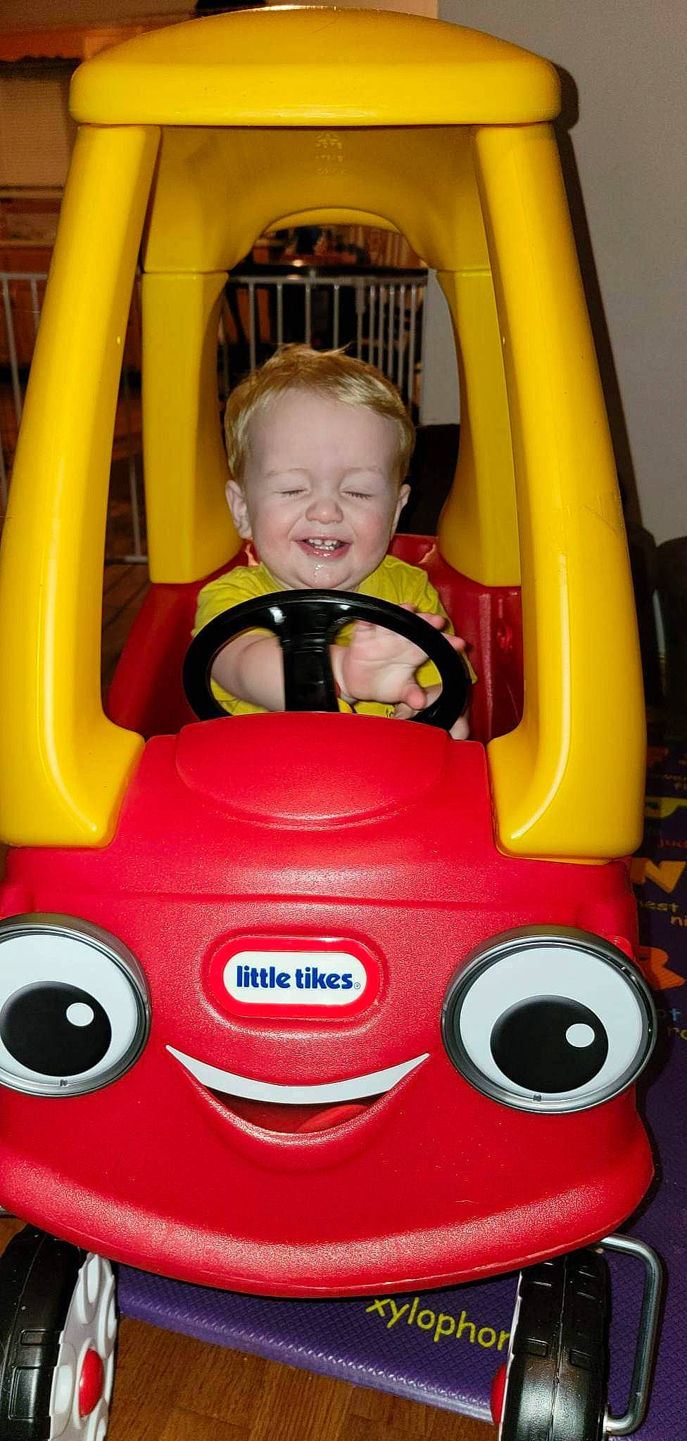 Kash joined the competition — help win amazing prizes! auto_part, automotive_design, automotive_exterior, automotive_lighting, baby, bumper, car, electric_blue, fun, joy, motor_vehicle, person, recreation, red, riding_toy, smile, toddler, toy, toy_vehicle, vehicle