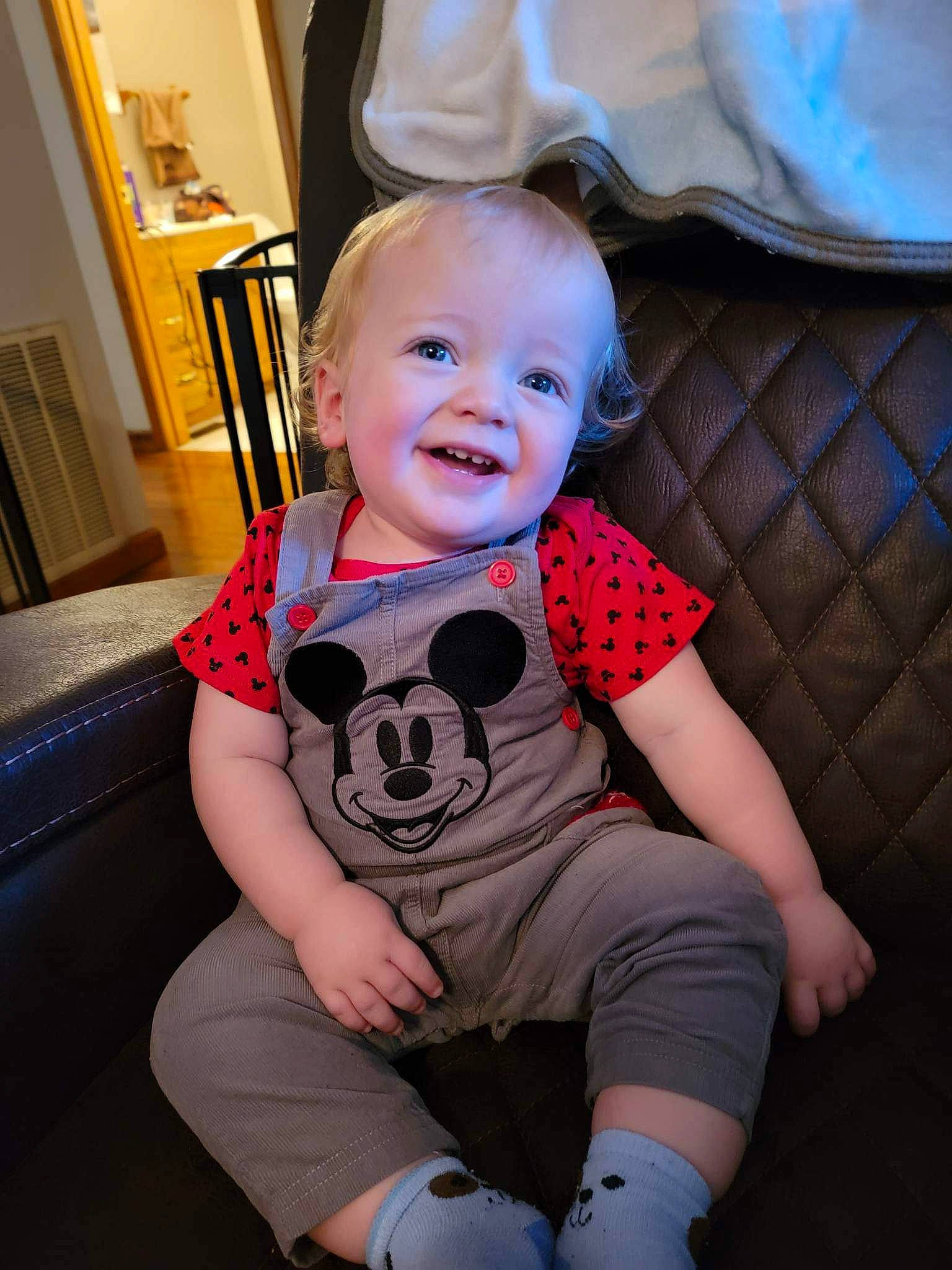 Kash joined the competition — help win amazing prizes! baby, baby_toddler_clothing, chair, comfort, companion_dog, couch, eye, fawn, happy, head, joy, knee, lap, person, pink, shorts, sitting, sleeve, smile, t_shirt