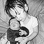 Liam participe au concours pour gagner de l'argent avec cette photo : child, baby, newborn, sibling, black_and_white, sleeping, cuddle, love, family, toddler, infant, portrait, soft_texture, blanket, clothing, hand, tattoo, peaceful, indoor, closeup