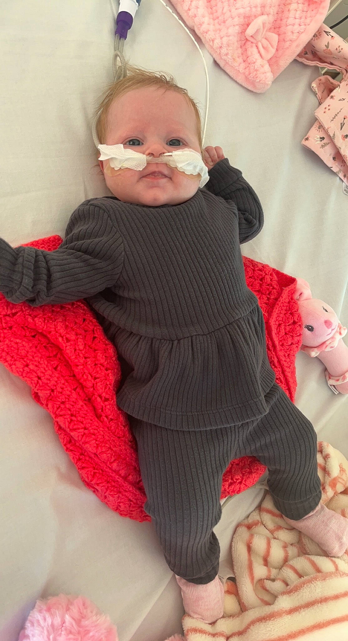 Tara-leigh joined the competition — help win amazing prizes! baby, baby_toddler_clothing, cheek, comfort, dress, eye, face, finger, hand, joint, knee, lap, leg, neck, person, pink, shoulder, skin, sleeve, textile