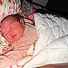 Adhara joined the competition — help win amazing prizes! baby, sleeping, blanket, quilt, pillow, floral, infant, cute, child, resting, bedroom, soft_lighting, peaceful, indoors, comfort, clothing, face, newborn, toddler, cute_outfit