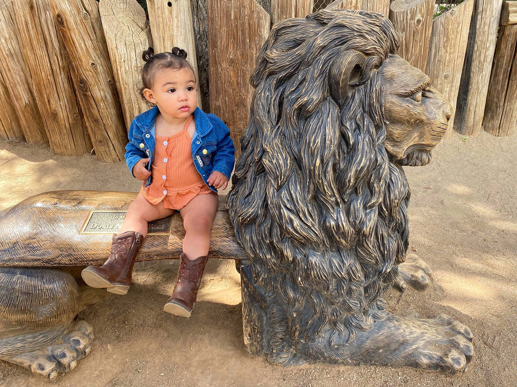 Ameliana is registered to the contest to win money with this photo: art, eye, fun, grass, hairstyle, happy, head, lawn_ornament, leg, leisure, metal, person, rock, shoe, sitting, sneakers, soil, toddler, tree, trunk