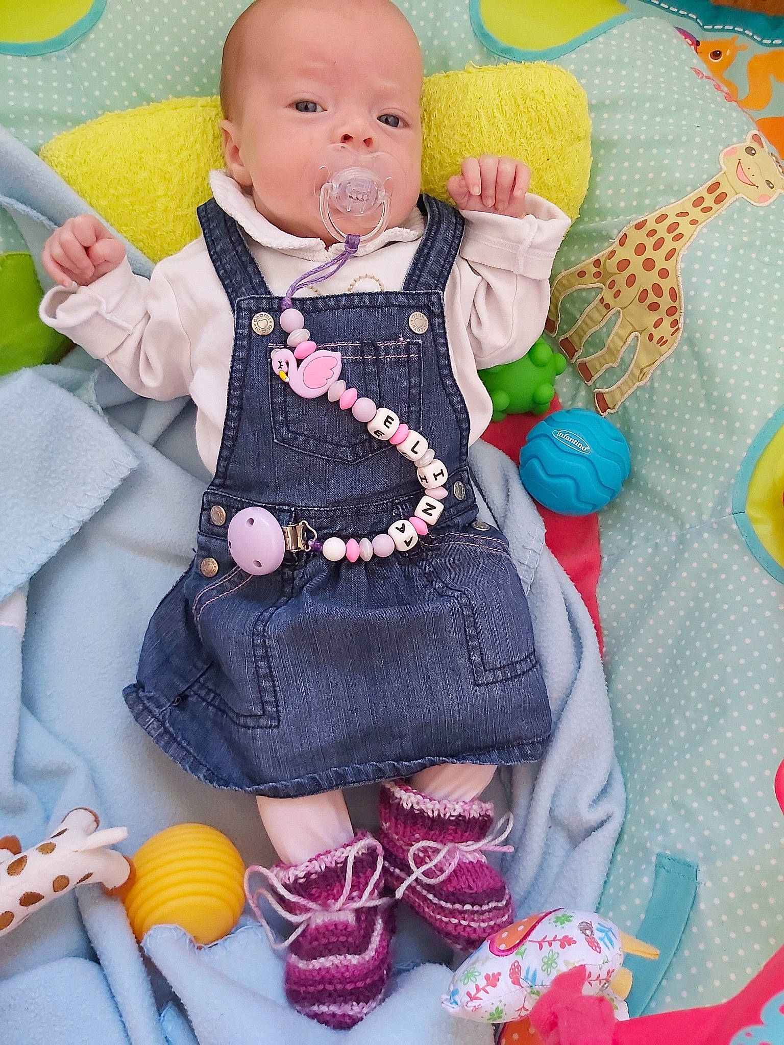 Elina a rejoint le concours — aidez-le/la à gagner de superbes lots ! baby, cheek, child, doll, knitting, pattern, person, pink, play, skin, smile, textile, toddler, toy