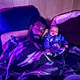 man, baby, sleeping, bed, blanket, pillow, purple_light, indoor, rest, cozy, peaceful, portrait, wooden_wall, relaxation, family, parent_and_child, nighttime, clothing, person, intimacy