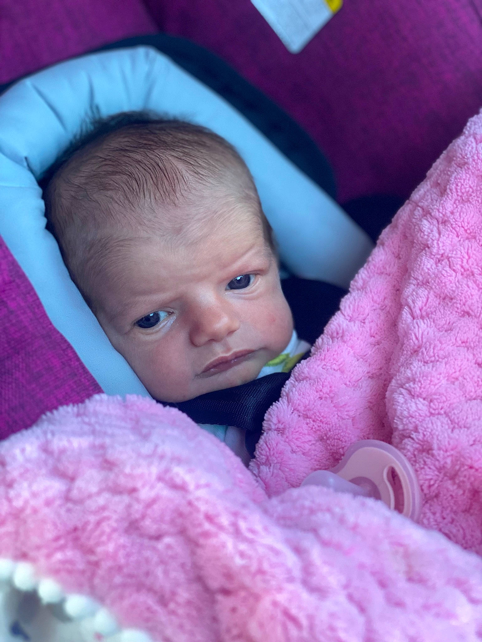 Oakleigh is registered to the contest to win money with this photo: baby, cheek, comfort, eye, eyebrow, face, facial_expression, gesture, hair, hairstyle, head, human, iris, lip, mouth, nose, person, pink, purple, skin