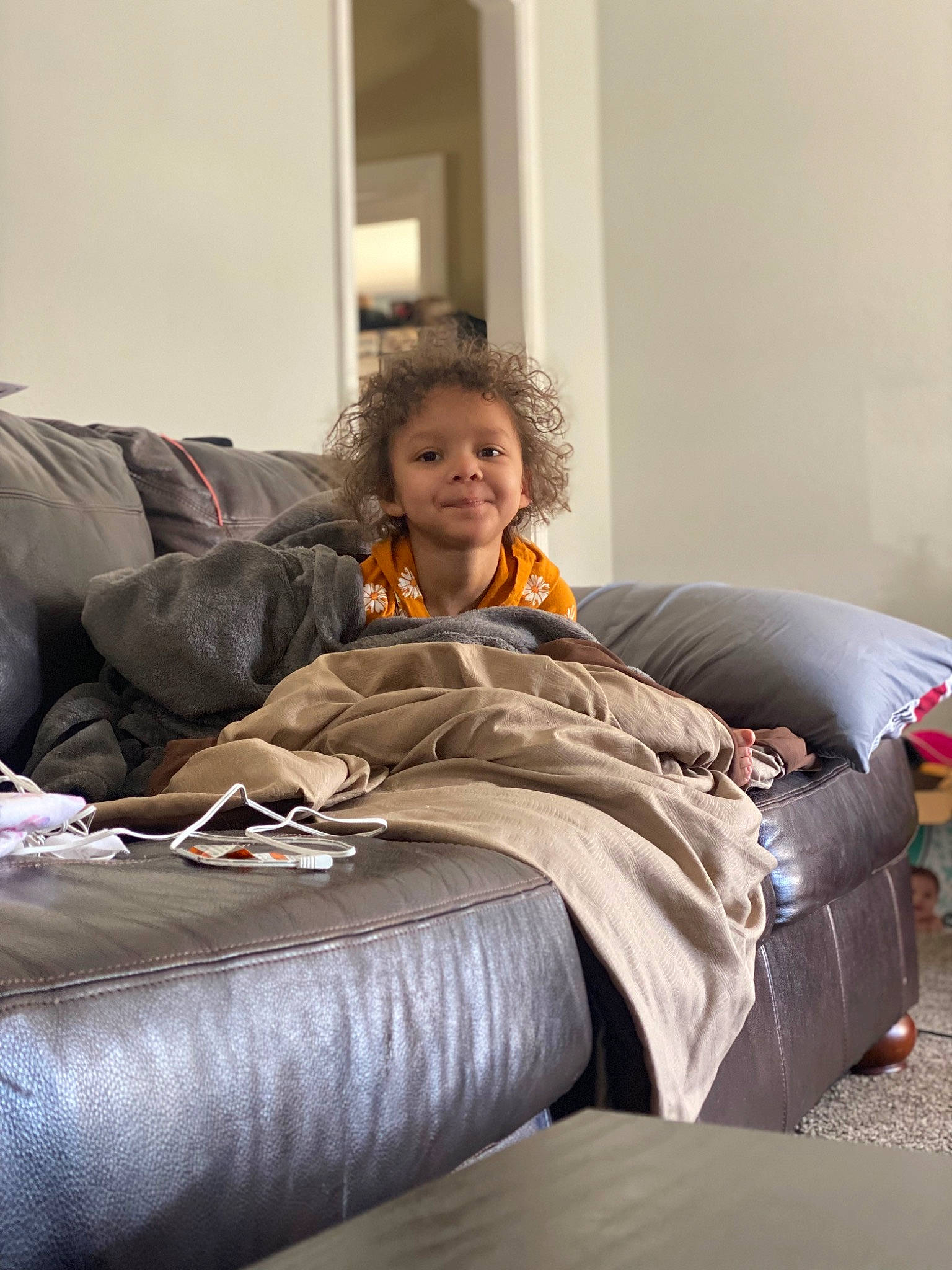 Farrah joined the competition — help win amazing prizes! comfort, couch, flooring, fun, fur, hardwood, human_leg, joy, knee, lap, leisure, linens, living_room, person, room, sitting, smile, sofa_bed, throw_pillow, toddler