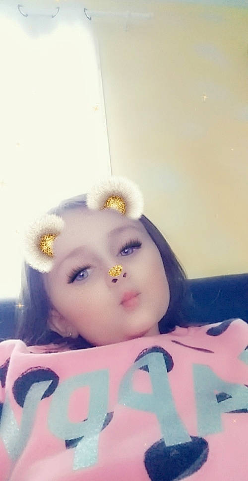 Milana participe au concours pour gagner de l'argent avec cette photo : cheek, child, doll, ear, eye, face, forehead, head, headwear, joint, lip, nose, person, photography, pink, skin, smile, toy