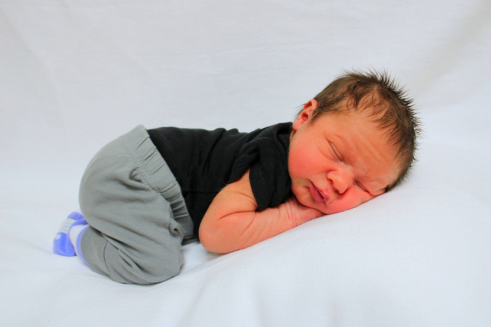 Robert joined the competition — help win amazing prizes! baby, baby_sleeping, baby_toddler_clothing, bed, bedding, bedtime, collar, comfort, flash_photography, fun, fur, happy, head, linens, long_sleeved_t_shirt, person, sitting, sleeve, t_shirt, toddler