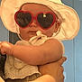 Evelyn joined the competition — help win amazing prizes! accessory, arm, baby, child, child_fashion, closeup, cute, face, fashion, hat, heart_shaped, holding, indoor, infant, lace, person, portrait, sunglasses, white_clothing, white_hat