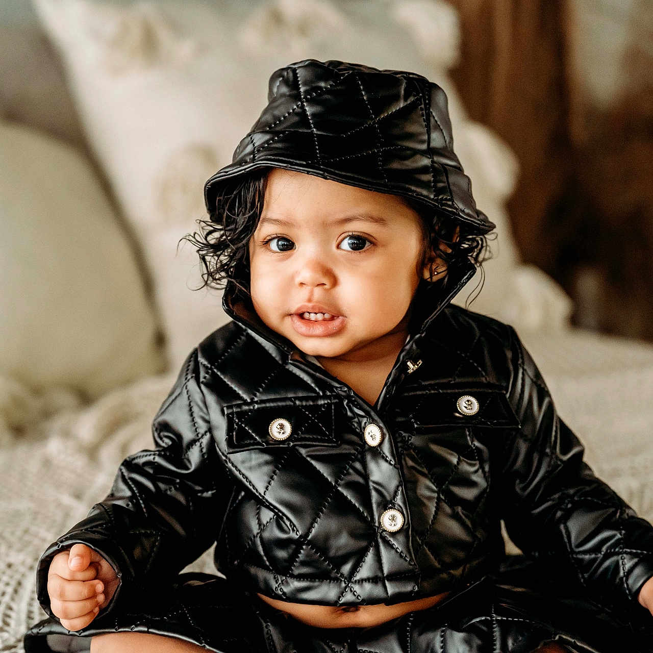 Weslyn Briana is registered to the contest to win money with this photo: baby, babylaughing, blackhair, clothing, coat, crawling, face, hair, happy, hat, head, hood, jacket, pants, person, photography, portrait, sitting, sleeve, smile