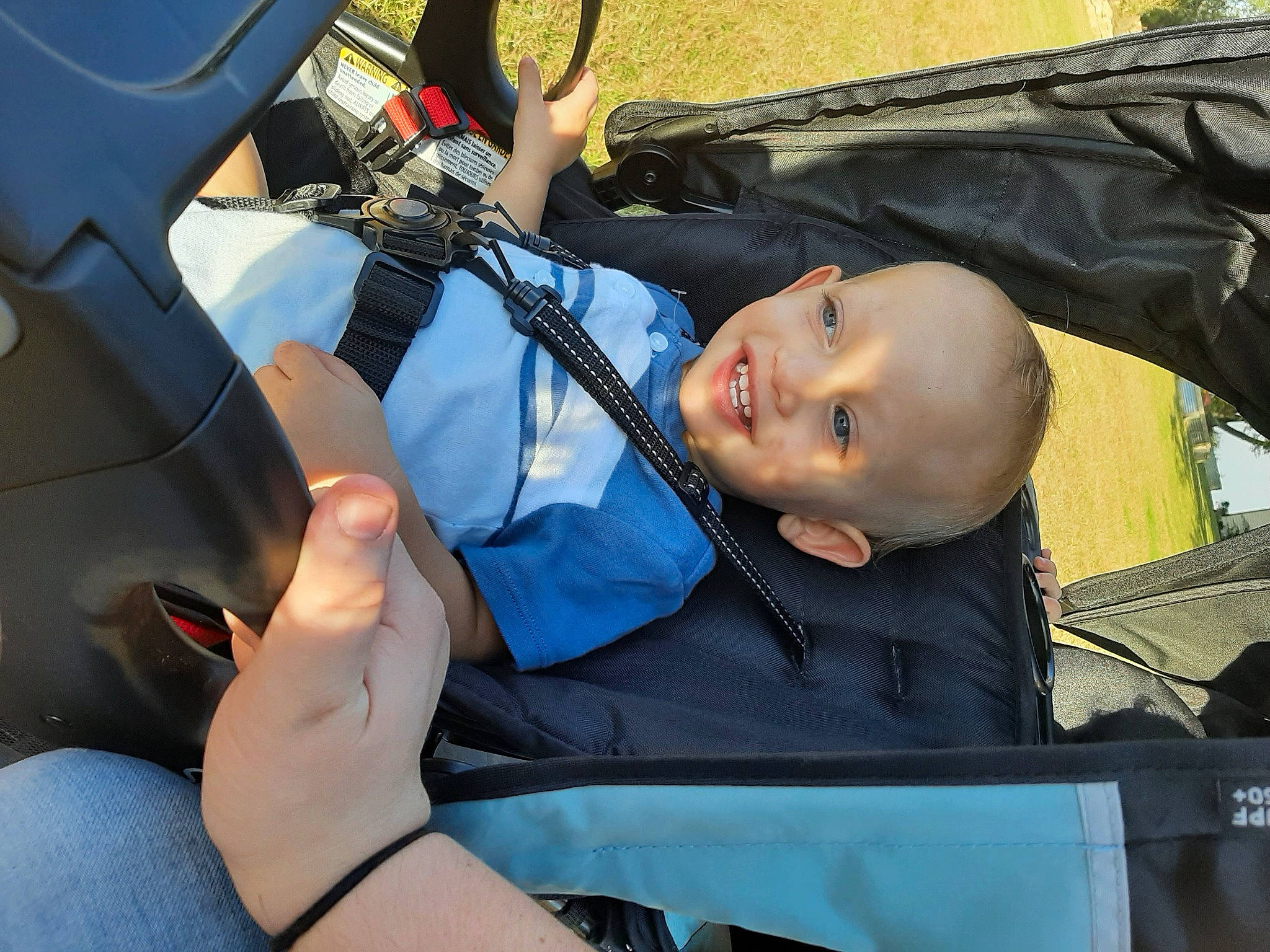 Kahlil joined the competition — help win amazing prizes! auto_part, automotive_design, automotive_exterior, automotive_tire, automotive_window_part, baby, baby_carriage, baby_products, bag, car_seat, child, comfort, electric_blue, hood, joy, motor_vehicle, person, steering_wheel, toddler, vehicle_door