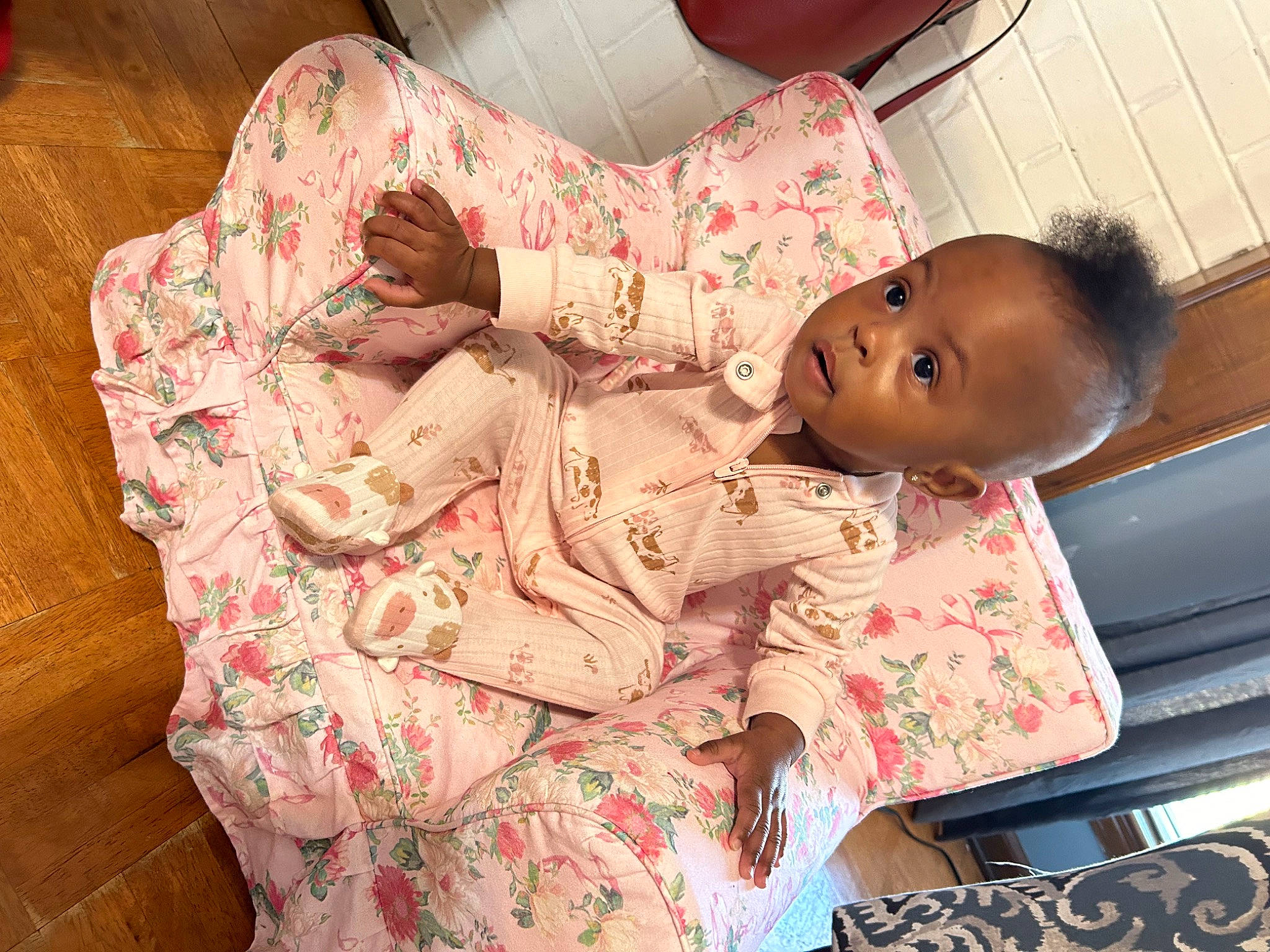 Eden joined the competition — help win amazing prizes! abdomen, baby, baby_toddler_clothing, bedding, child, comfort, facial_expression, happy, human_leg, leg, linens, mouth, pattern, person, pink, sitting, skin, textile, thigh, toddler
