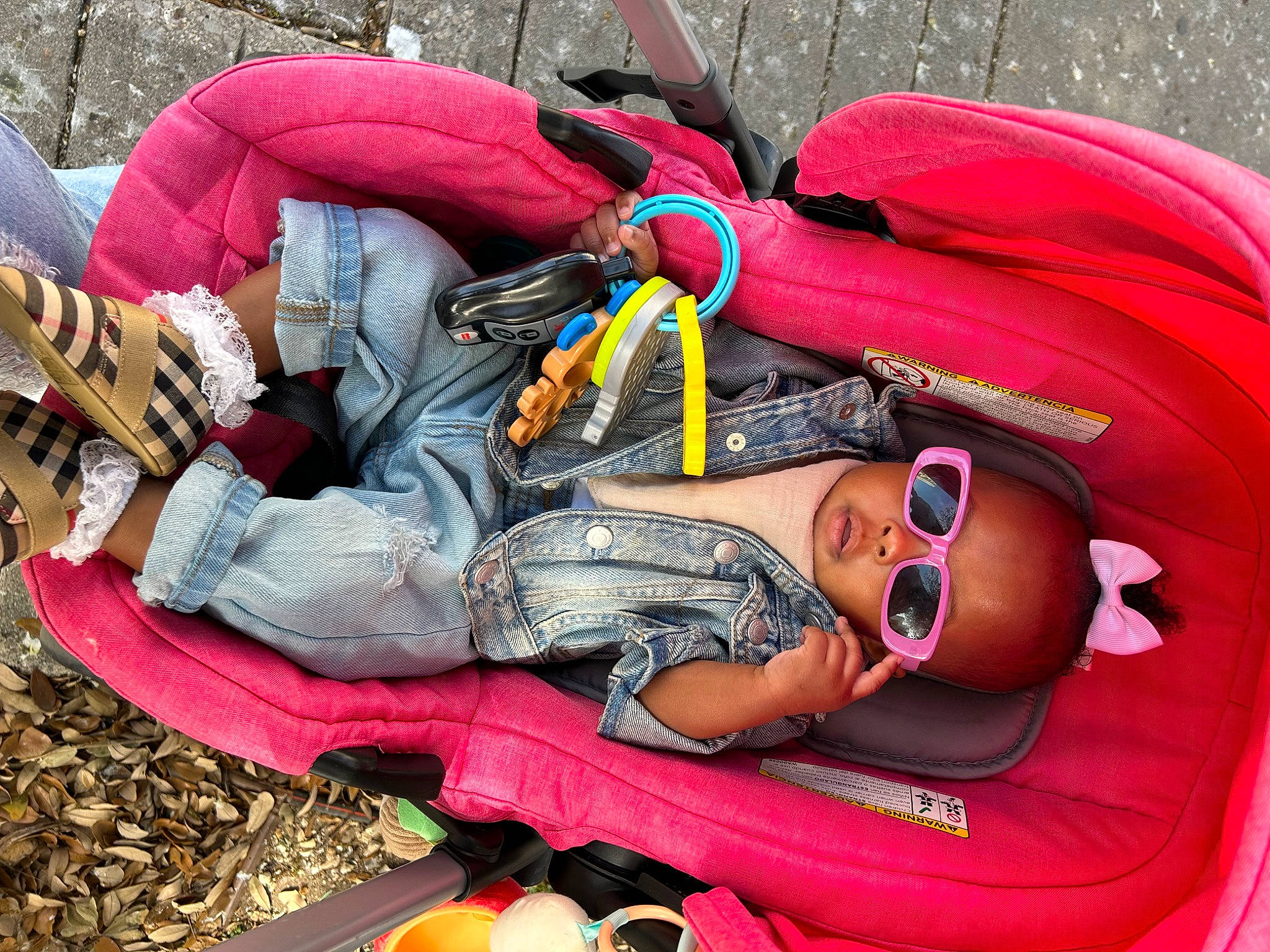 Eden joined the competition — help win amazing prizes! backpack, bag, carmine, child, comfort, costume, fun, grass, leisure, luggage_and_bags, magenta, nap, pattern, person, personal_protective_equipment, recreation, sitting, sunglasses, textile, vacation