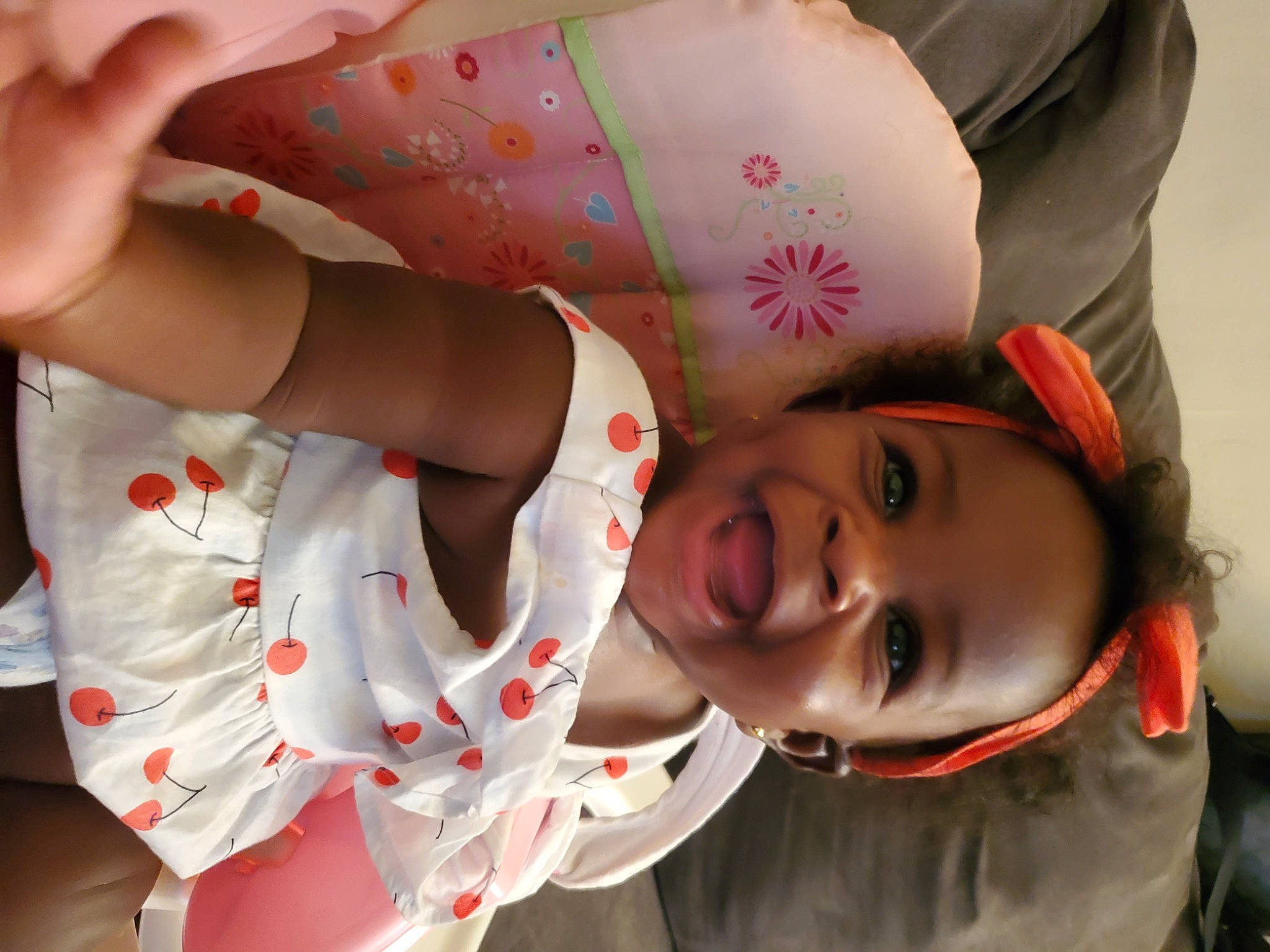 Kylee is registered to the contest to win money with this photo: baby, baby_toddler_clothing, carmine, cheek, child, elbow, event, fun, gesture, hand, happy, human_body, joy, lip, mouth, person, skin, sleeve, smile, toddler