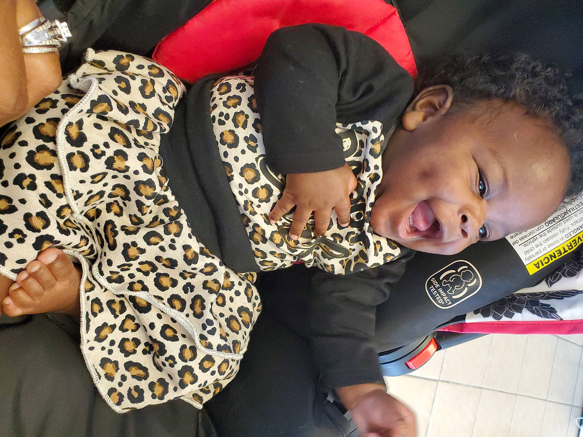 Kylee is registered to the contest to win money with this photo: black_hair, child, comfort, elbow, fashion_accessory, flooring, flowerpot, fun, gesture, happy, houseplant, human_leg, jewellery, knee, leggings, pattern, person, sitting, sleeve, thigh