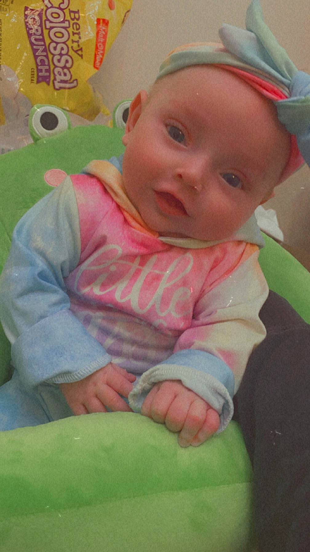 Jayceanna is registered to the contest to win money with this photo: baby, baby_products, baby_safety, baby_toddler_clothing, cheek, child, comfort, fun, grass, green, happy, linens, mouth, nose, organ, person, pink, skin, smile, toddler