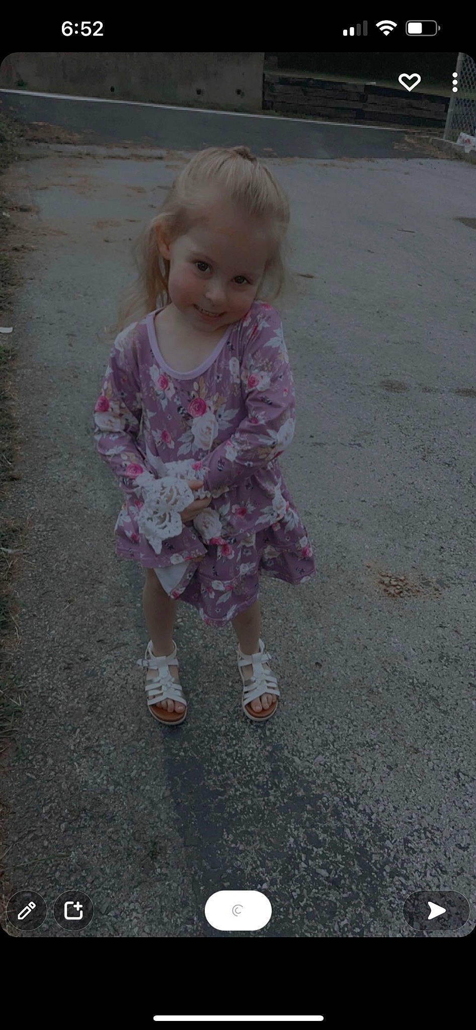 Nevaeh is registered to the contest to win money with this photo: asphalt, baby_toddler_clothing, blond, child, face, fun, grass, hair, head, human_leg, joy, magenta, pattern, person, pink, road_surface, sand, sitting, sleeve, tar