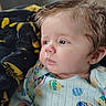 Bellamy joined the competition — help win amazing prizes! baby, child, face, blue_eyes, hair, onesie, patterned_clothing, blanket, indoor, portrait, cute, infant, skin, expression, resting, closeup, toddler, soft_light, head, young_child