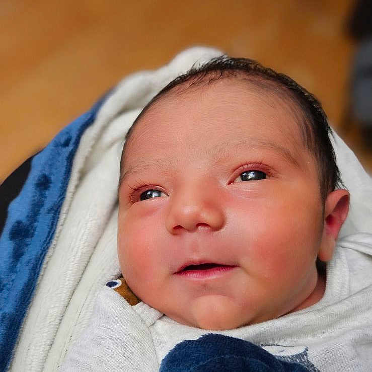 Edward joined the competition — help win amazing prizes! baby, blanket, clothing, coat, cushion, face, glove, happy, head, homedecor, jacket, newborn, pants, person, photography, portrait, quilt, sleeping, smile, towel