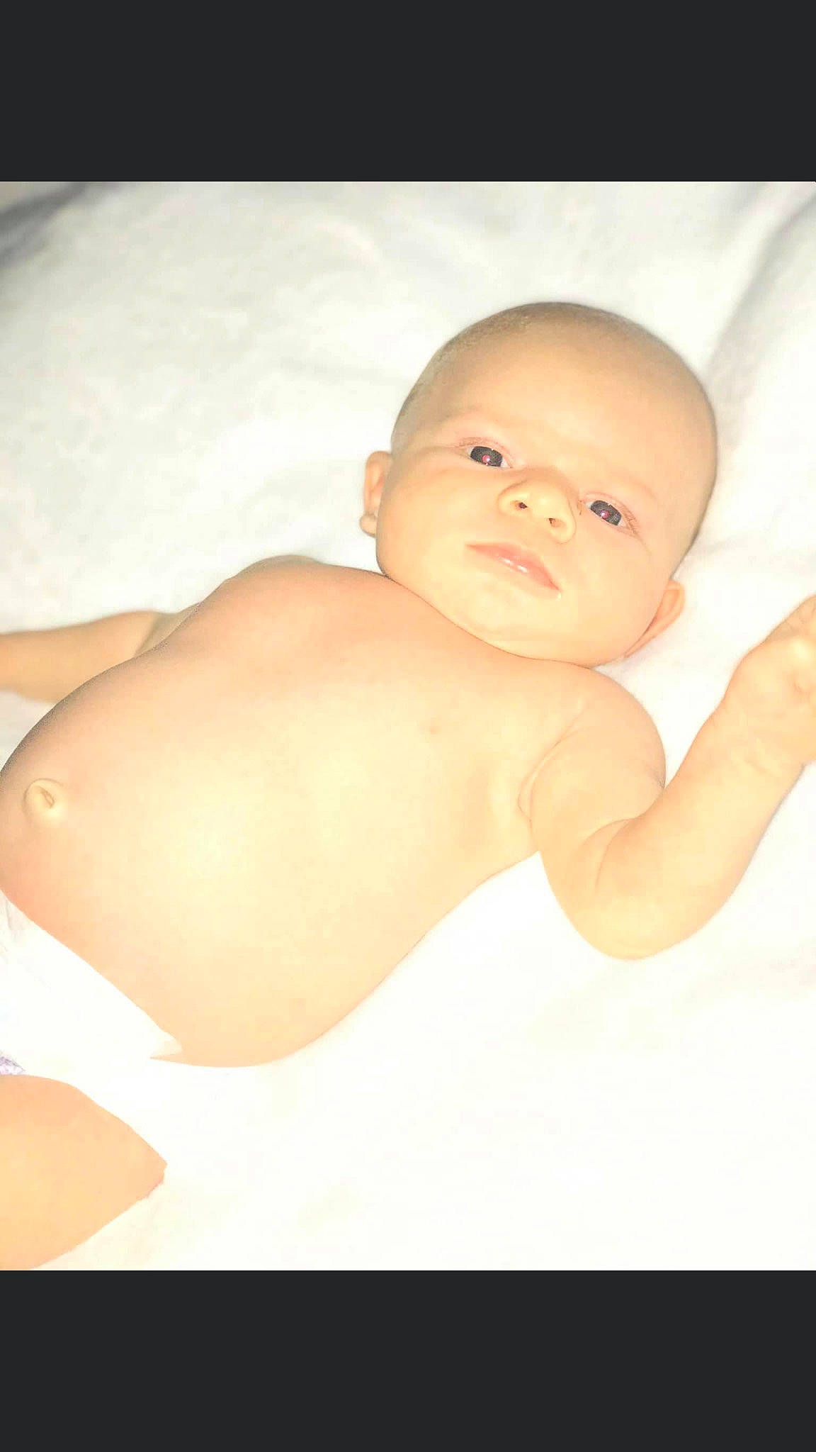 Brantley is registered to the contest to win money with this photo: abdomen, arm, baby, chest, comfort, elbow, eye, face, finger, flash_photography, hair, head, muscle, neck, person, skin, smile, stomach, thigh, toddler