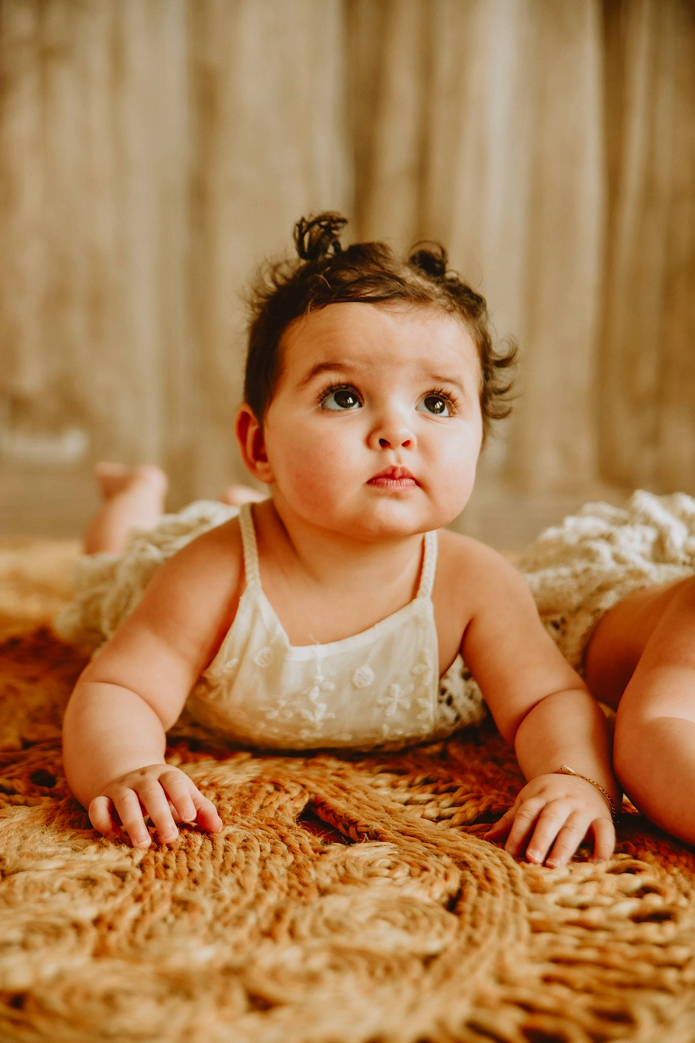Arden is registered to the contest to win money with this photo: baby, baby_toddler_clothing, child, eye, face, flash_photography, flooring, fun, grass, happy, headpiece, peach, people_in_nature, person, portrait, portrait_photography, sitting, skin, still_life_photography, surprise