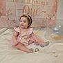 Odessa is registered to the contest to win money with this photo: child, baby, toddler, girl, birthday, banner, balloon, pink_dress, headband, sparkly_shoes, blanket, seated, confetti, glitter, portrait, celebration, indoor, wall, decorations, cute