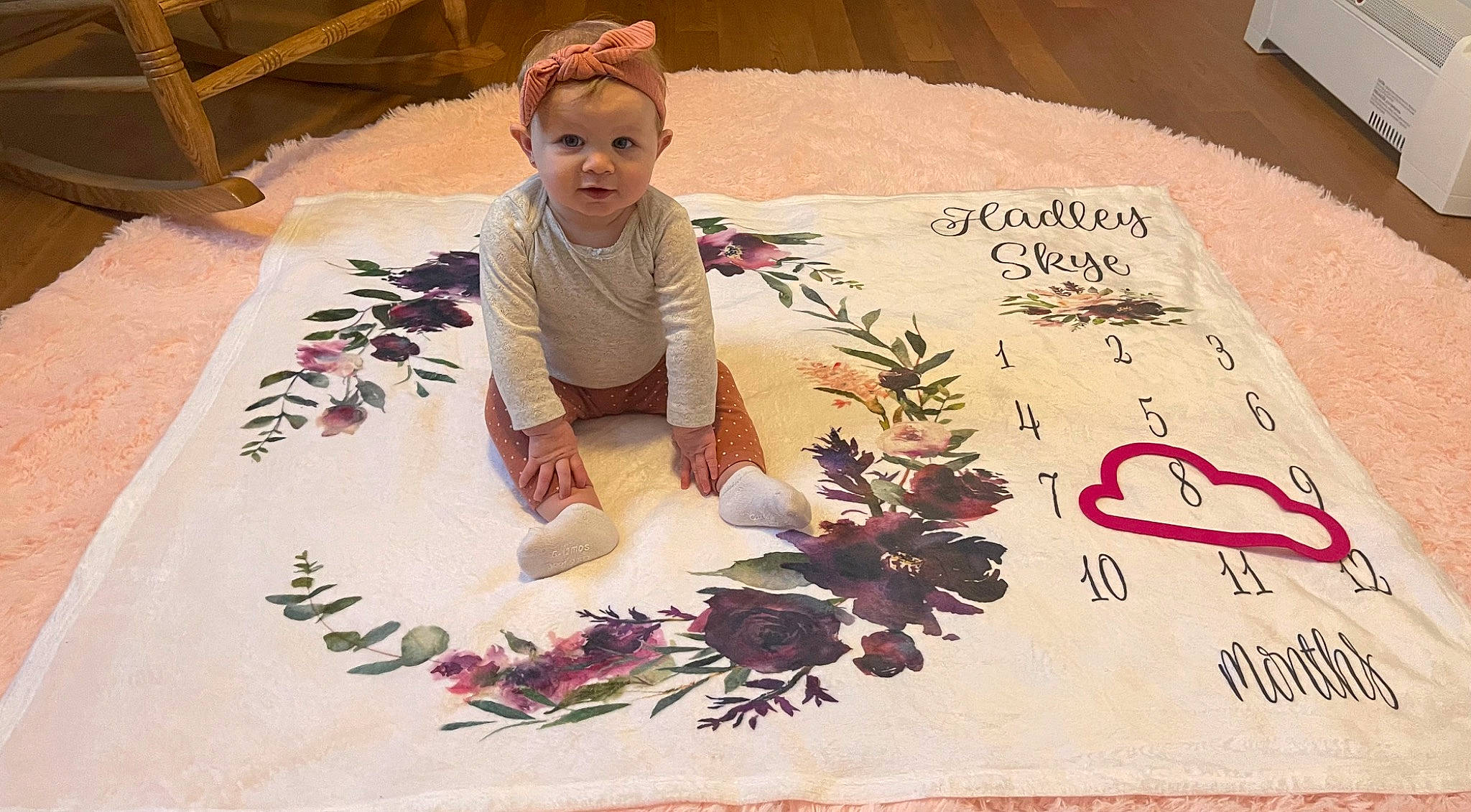 Hadley is registered to the contest to win money with this photo: art, baby, carmine, craft, creative_arts, design, flooring, floral_design, floristry, flower_arranging, font, illustration, linens, pattern, person, petal, plant, t_shirt, textile, toddler