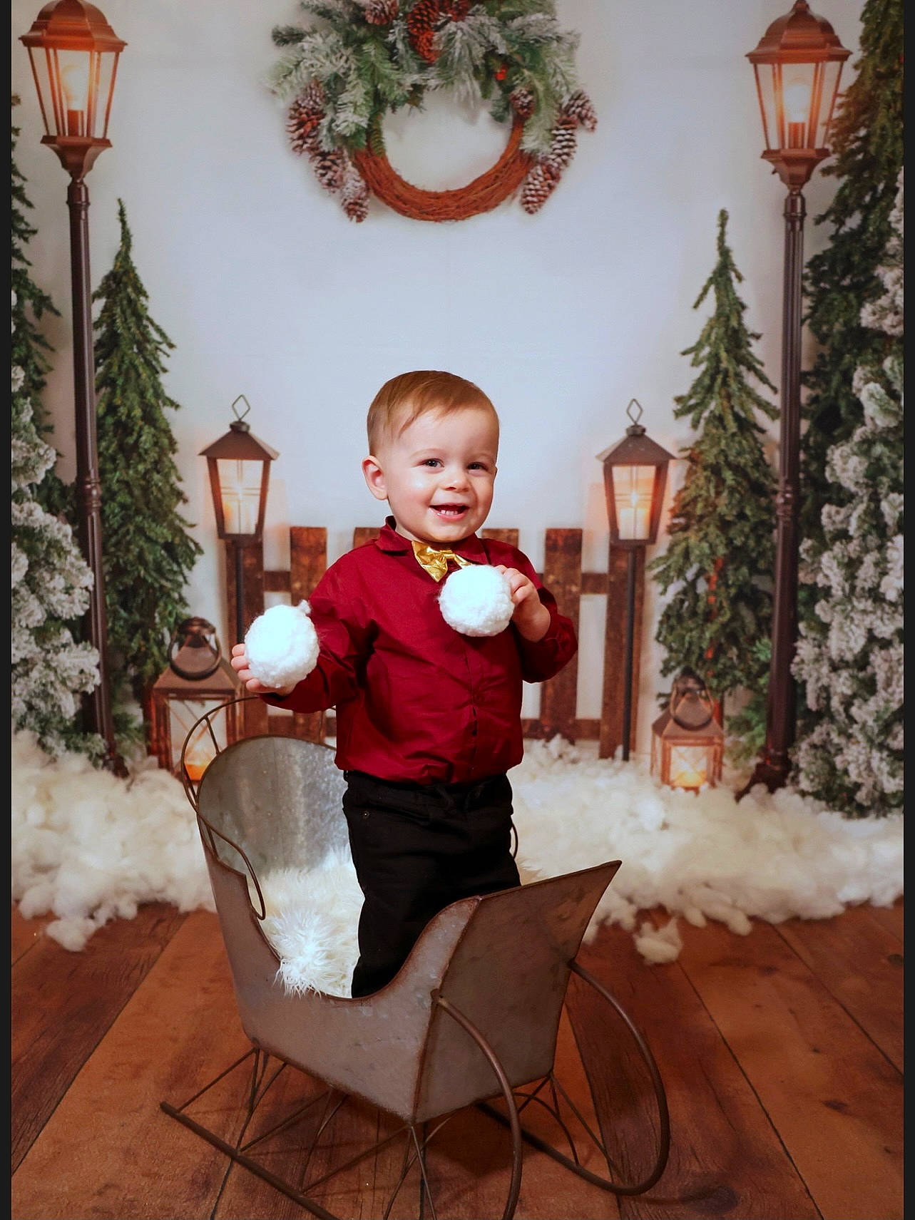 Cash is registered to the contest to win money with this photo: baby_toddler_clothing, chair, christmas_decoration, christmas_ornament, christmas_tree, comfort, event, holiday, holiday_ornament, interior_design, joy, lap, living_room, mammal, ornament, person, photograph, plant, toddler, tree