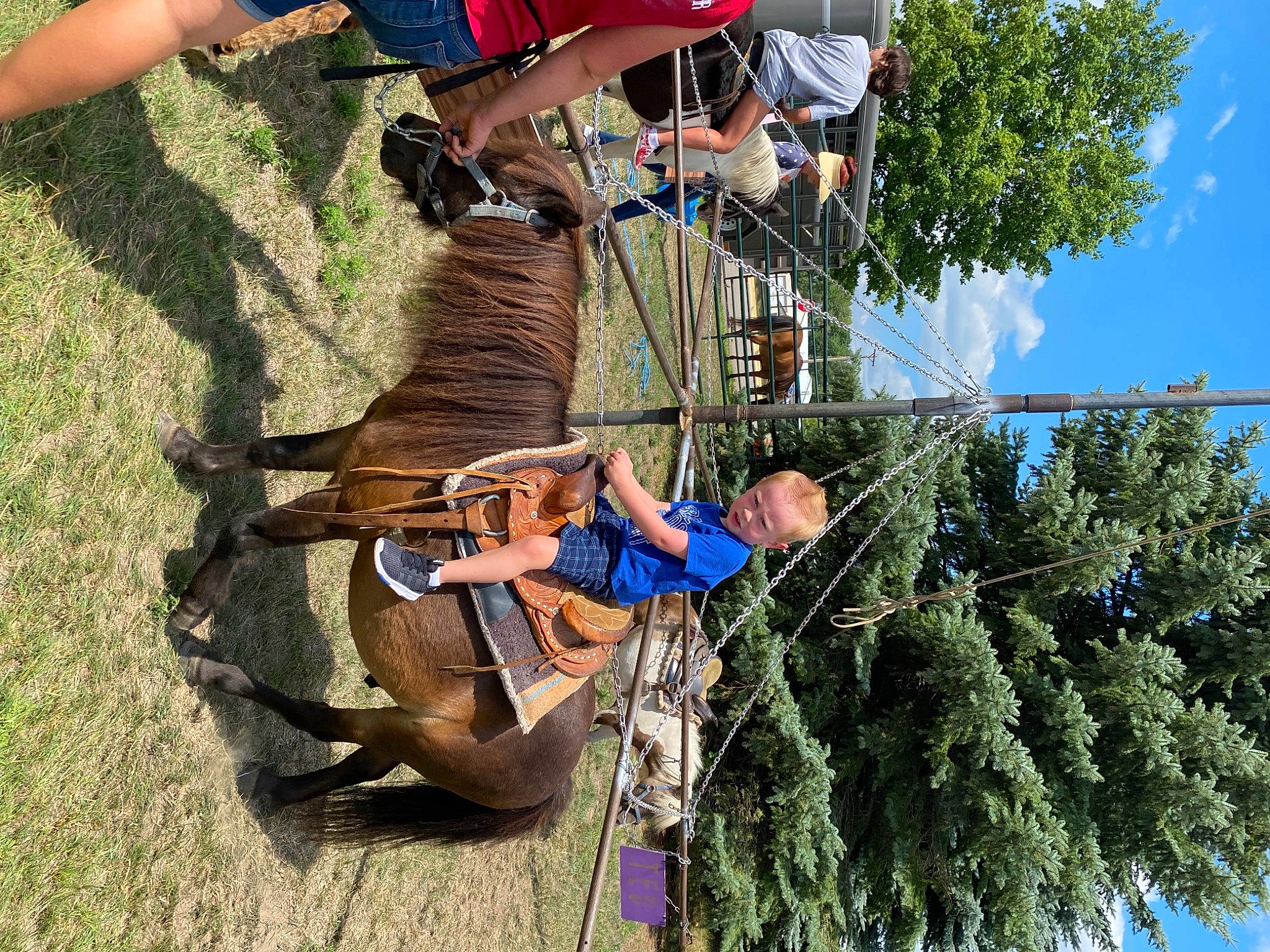 Kaiden joined the competition — help win amazing prizes! adventure, boot, climbing_harness, cloud, electric_blue, fun, hat, leisure, outdoor_recreation, person, plant, pole, recreation, rock_climbing_equipment, rope, shoe, shorts, sky, sneakers, t_shirt