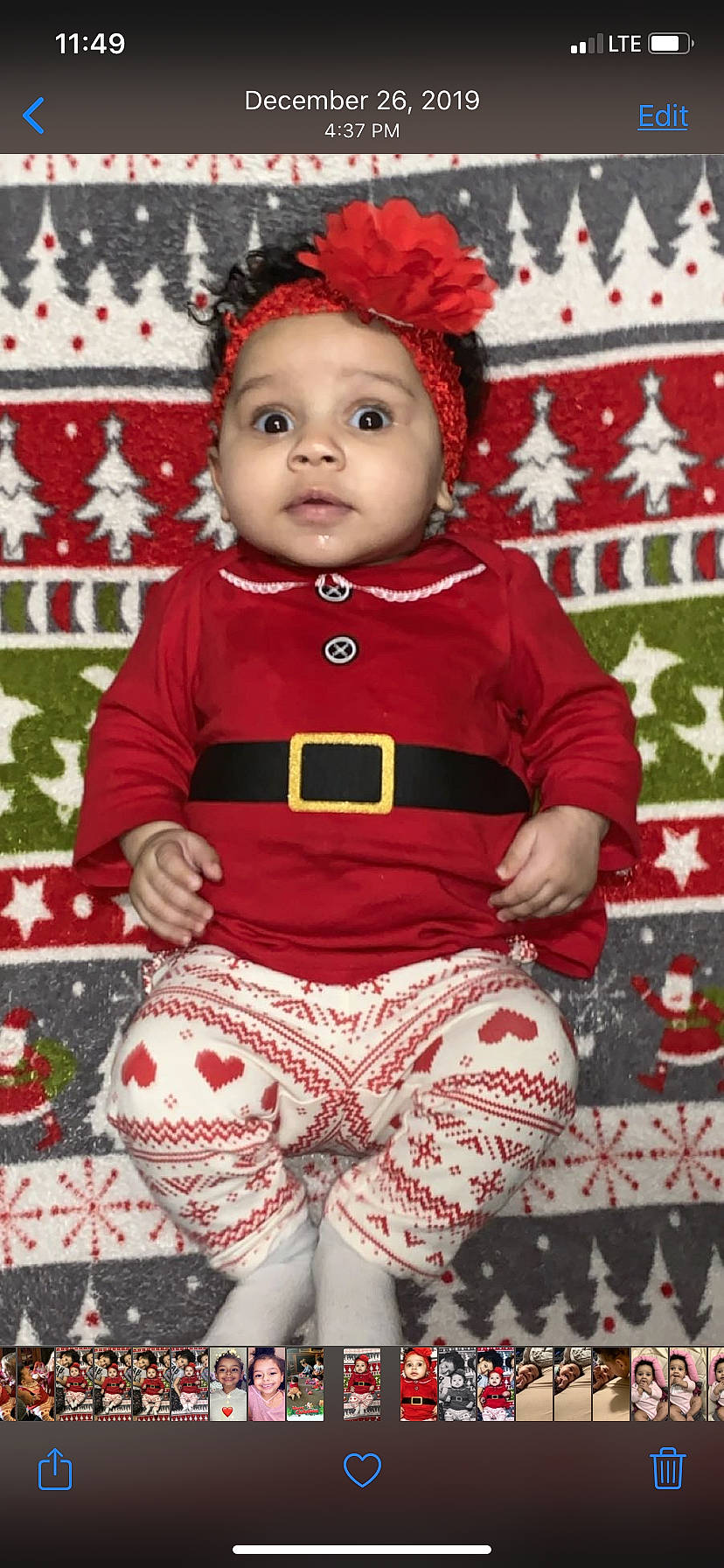 Riyah joined the competition — help win amazing prizes! baby_toddler_clothing, child, christmas, christmas_eve, costume, headwear, joy, pattern, person, red, sleeve, toddler