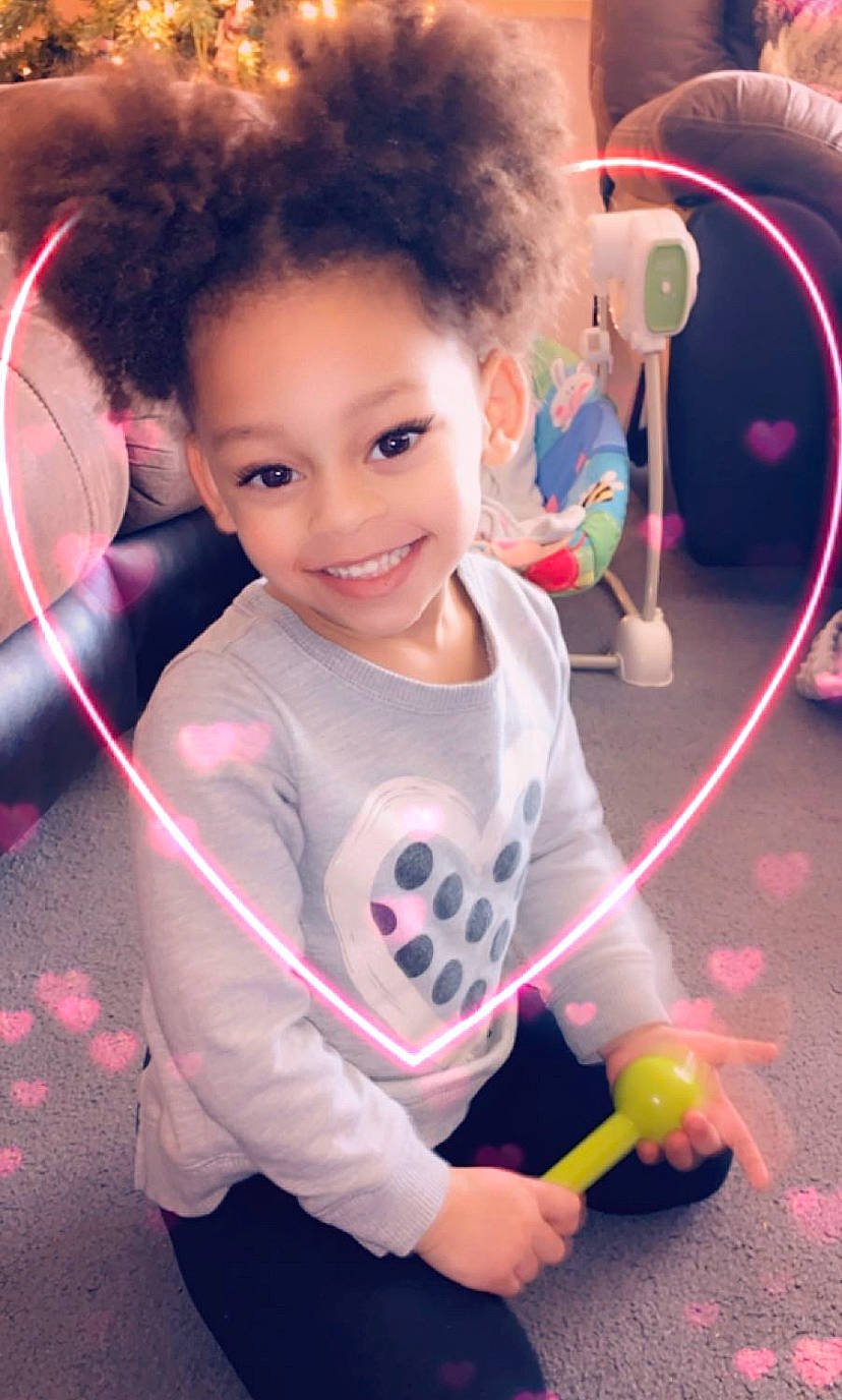 Niyah is registered to the contest to win money with this photo: child, fun, joy, person, pink, play, skipping_rope, smile, space, toddler, toy