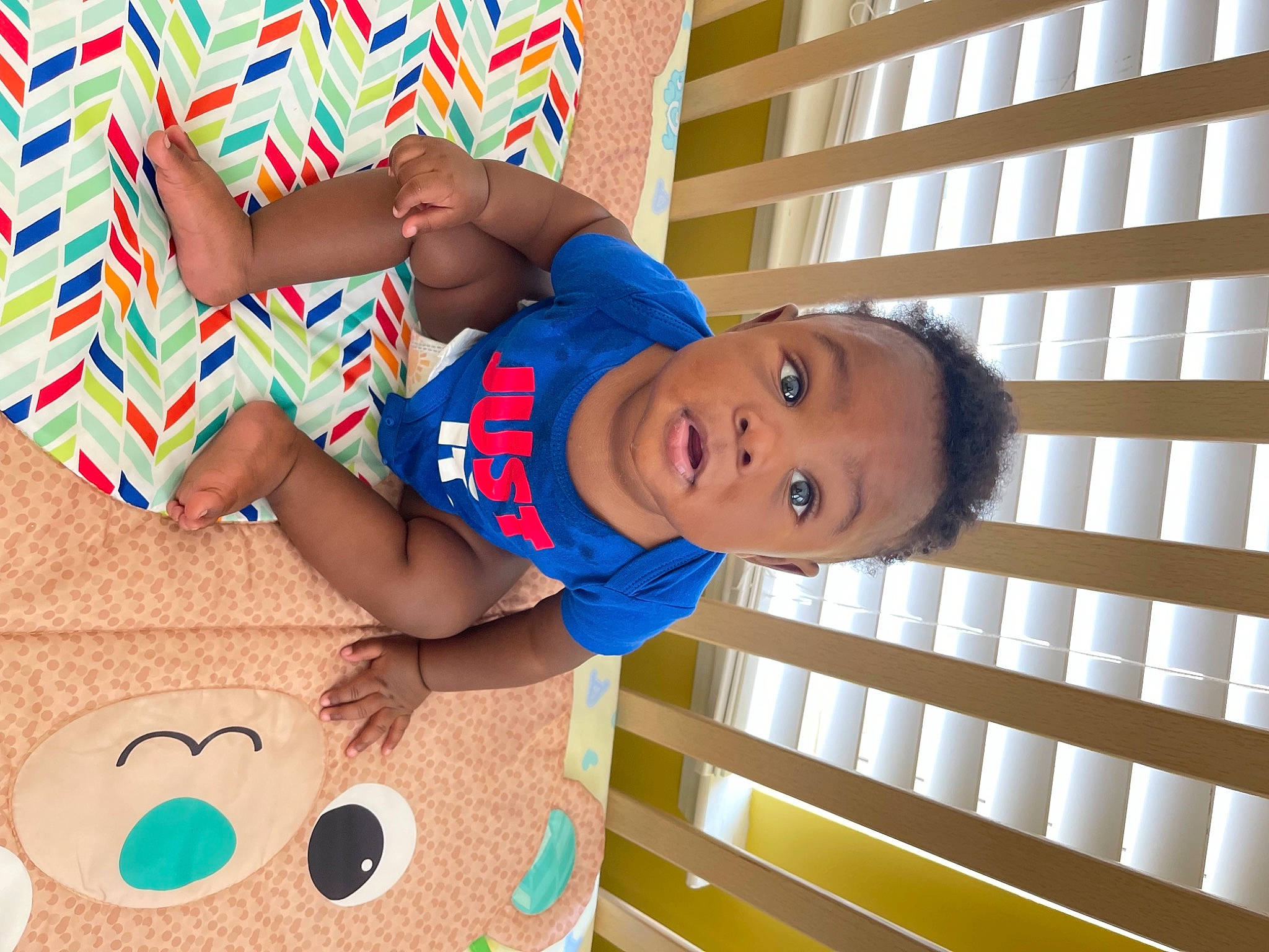 Taylin joined the competition — help win amazing prizes! baby, baby_toddler_clothing, child, clothing, elbow, electric_blue, facial_expression, finger, fun, happy, hat, leisure, organ, pattern, person, room, t_shirt, textile, thigh, toddler