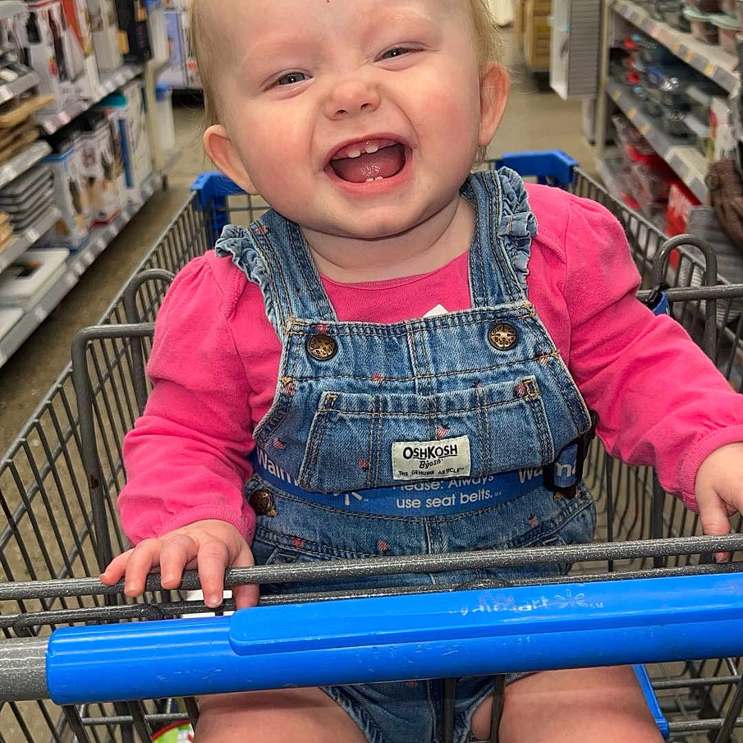 Deelylah joined the competition — help win amazing prizes! aisle, baby, cheerful, child, cute, denim_overalls, grocery, happy, indoor, infant, person, pink_shirt, products, retail, seat_belt, shopping, shopping_cart, smiling, store, toddler