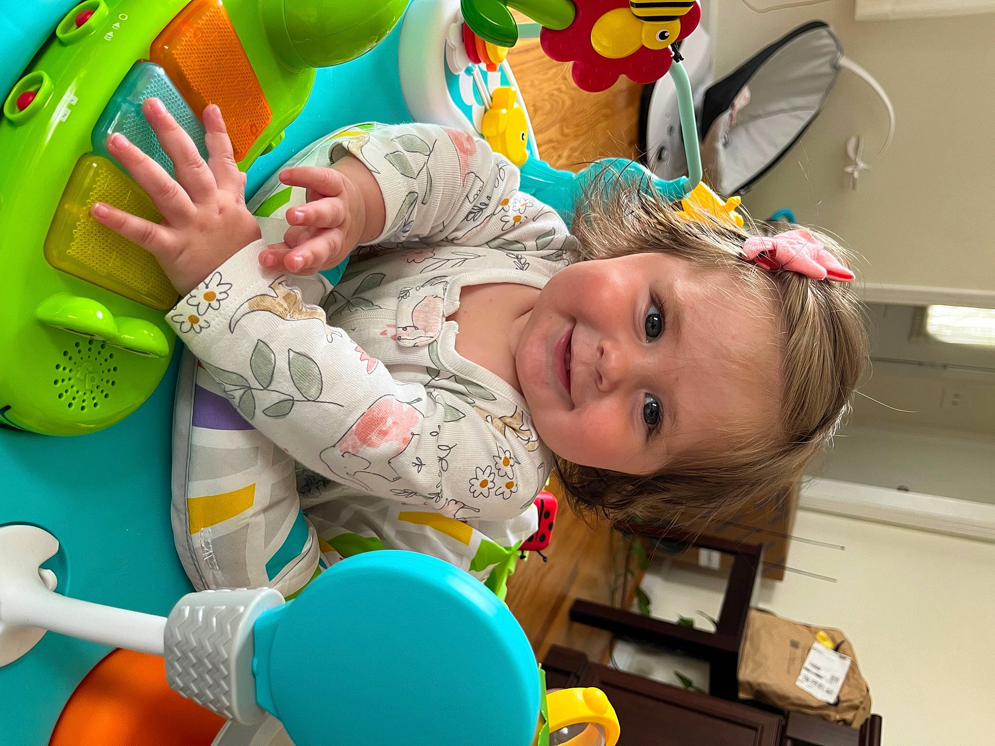 Francesca is registered to the contest to win money with this photo: baby, baby_playing_with_toys, baby_products, baby_toddler_clothing, baby_toys, child, facial_expression, fun, green, happy, joy, organ, people, person, product, room, skin, smile, snapshot, toddler