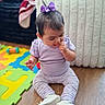 Venus joined the competition — help win amazing prizes! baby, child, colorful, curious, cute, floor_mat, foam_puzzle_mat, footwear, home, indoor, infant, lavender_clothing, playful, purple_bow, sitting, toddler, toy, white_shoes, wooden_floor, young_child